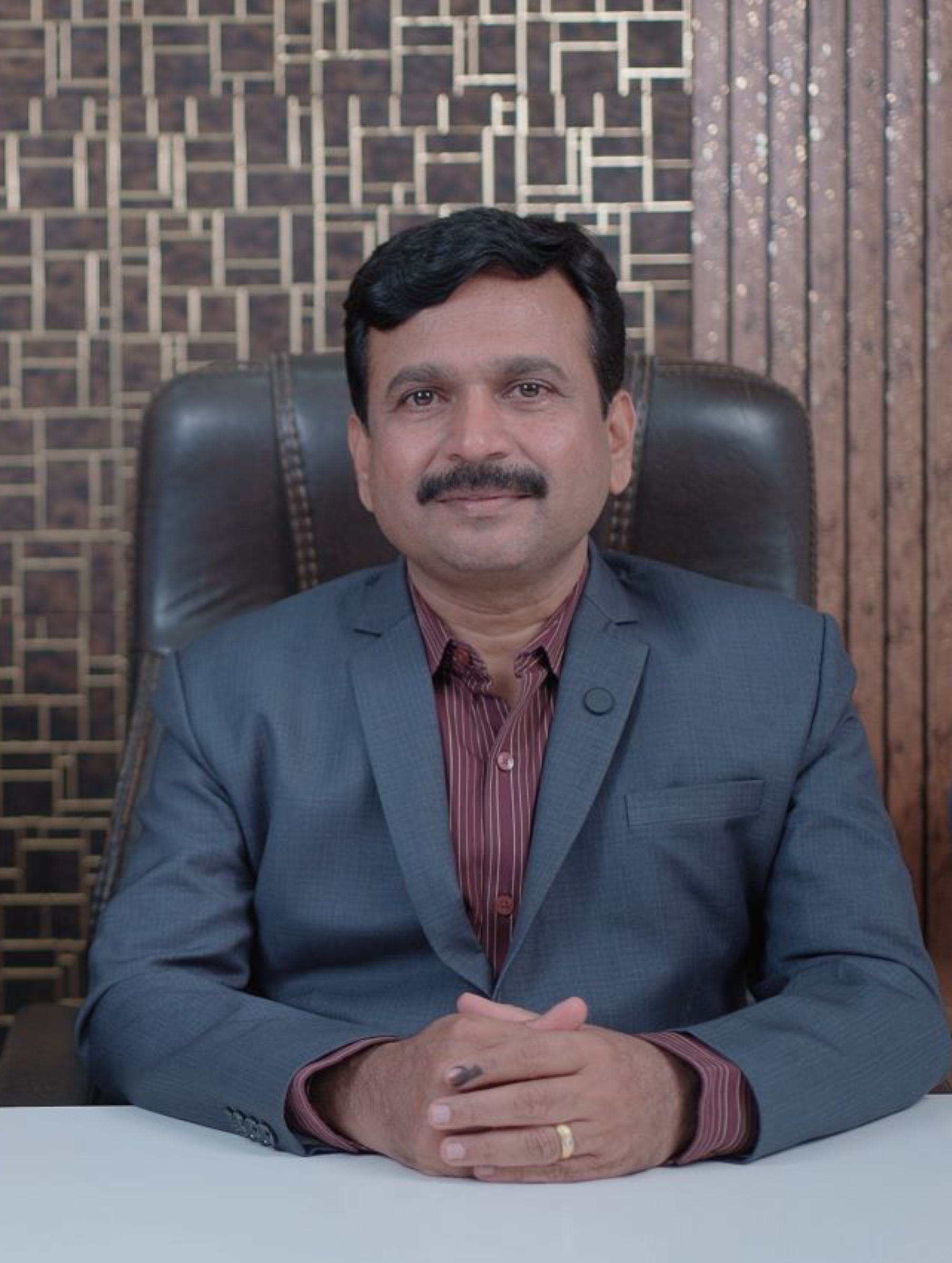 Mr. Balasaheb Dhulugade